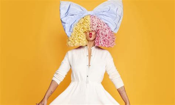 Uncover the Enigmatic World of Sia: Exploring the Artist's Mysterious Allure