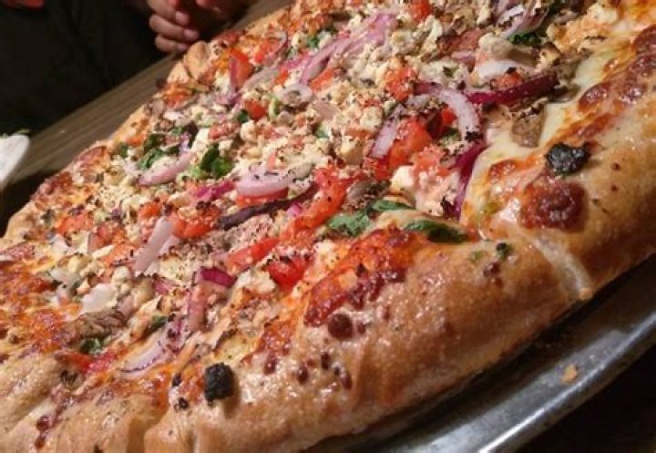 Hounddog's Three Degree Pizza: A Culinary Delight for Pizza Lovers