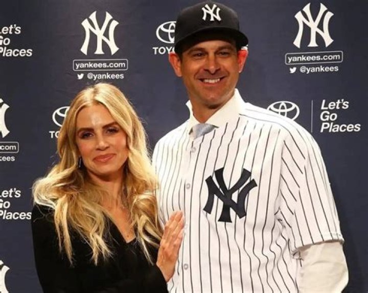Unveiling the Connection: Laura Cover Aaron Boone