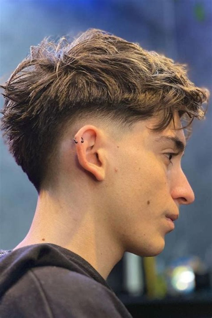 Unleashing the Mullet Fade: A Trendy Transformation